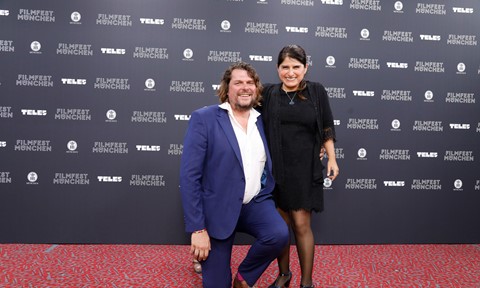 Curator Florian Borchmeyer with award recipient Melina León 